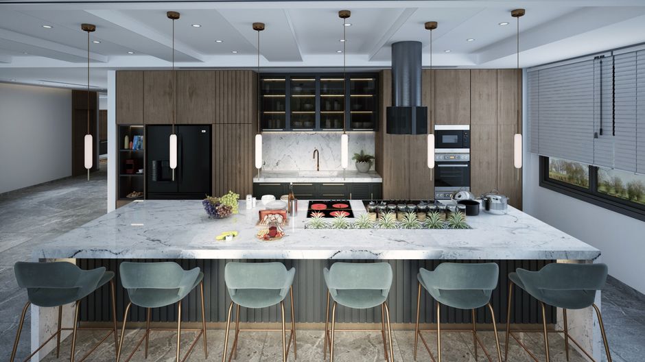 Spacious modern kitchen with marble island, pendant lights, and sleek appliances.
